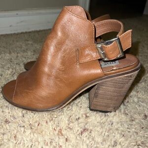 Brown wedge heels.  Steve Madden